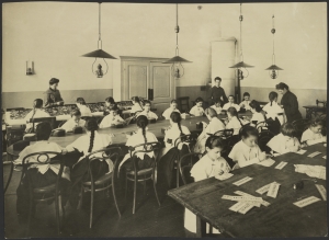 Photograph taken by Karl Karlovich Bulla, showing an embroidery lesson. Pre-Revolutionary Russia.