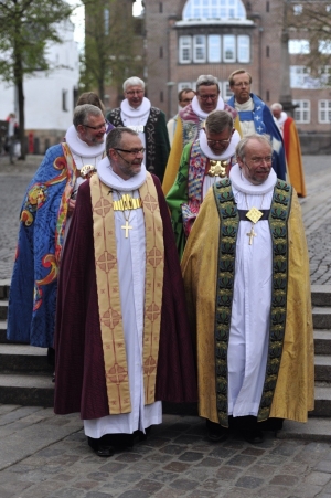 Lutheran bishops wearing their cope over a cassock. See also their ruffs around the neck. Denmark, 