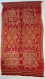 A wedding shawl in red wool with Jat cotton embroidery using cotton thread and mirrors (mid-20th century; Shekawati district, Rajasthan).