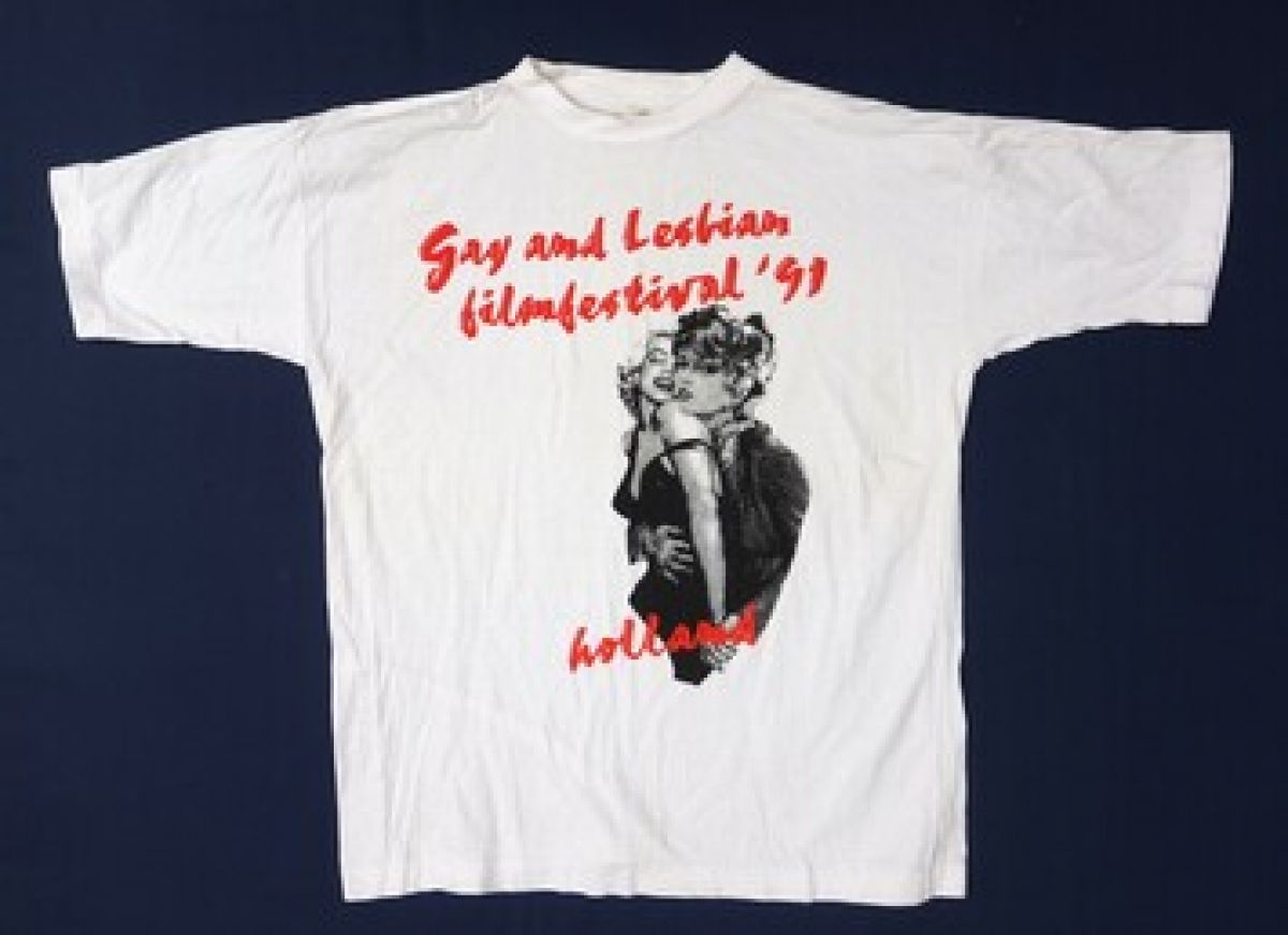 White T-shirt  with the text &quot;Gay and Lesbian filmfestival &#039;91 Holland&quot; and the image of Marilyn Monroe and Gina Lollobrigida embracing.