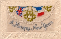 A silk embroidered postcard with the British and French flags.