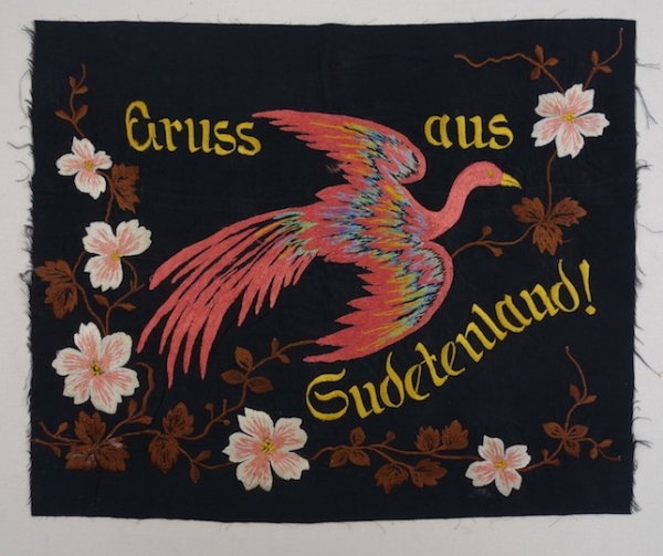 Embroidered panel with the text &#039;Gruss aus Sudetenland&#039;. Sudetenland was occupied by Nazi Germany in October 1938.