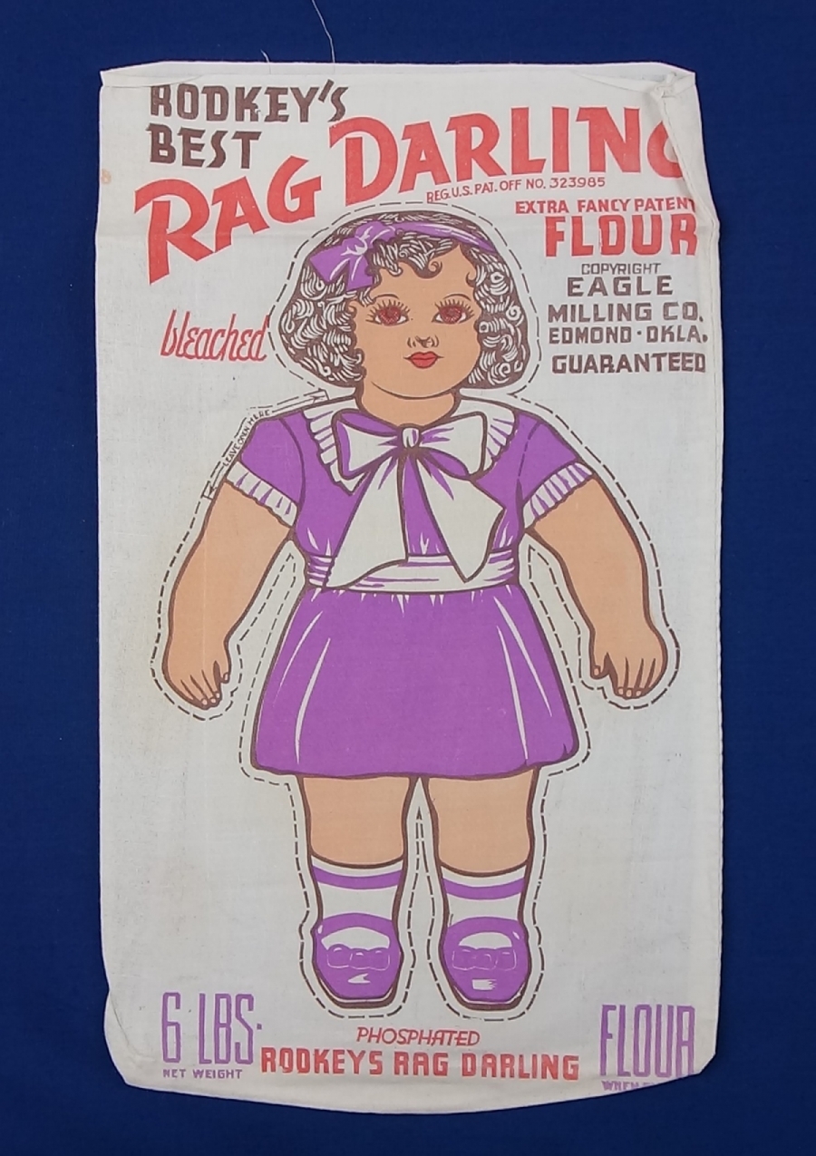 The 'Rag Darling' cloth doll was registered by the Department of State, Oklahoma, USA, in June 1937 (TRC 2017.3232).