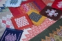Examples of hishizashi embroideries.