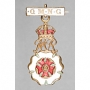 Badge of the Queen Mother&#039;s Clothing Guild, formerly known as the Queen Mary&#039;s Needlework Guild (QMNG).