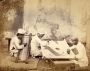 Photograph of Indian gold embroiderers, dated 1873.