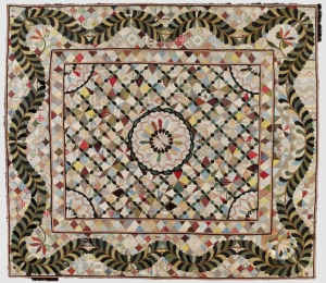 Bed cover, English, early 19th century. Pieced silk and cotton.