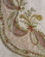Fragment of a late 18th century French court mantua-style dress. It is made of mbroidered silk satin, with silks, velvet appliqué, chenille, metal purl and swansdown.