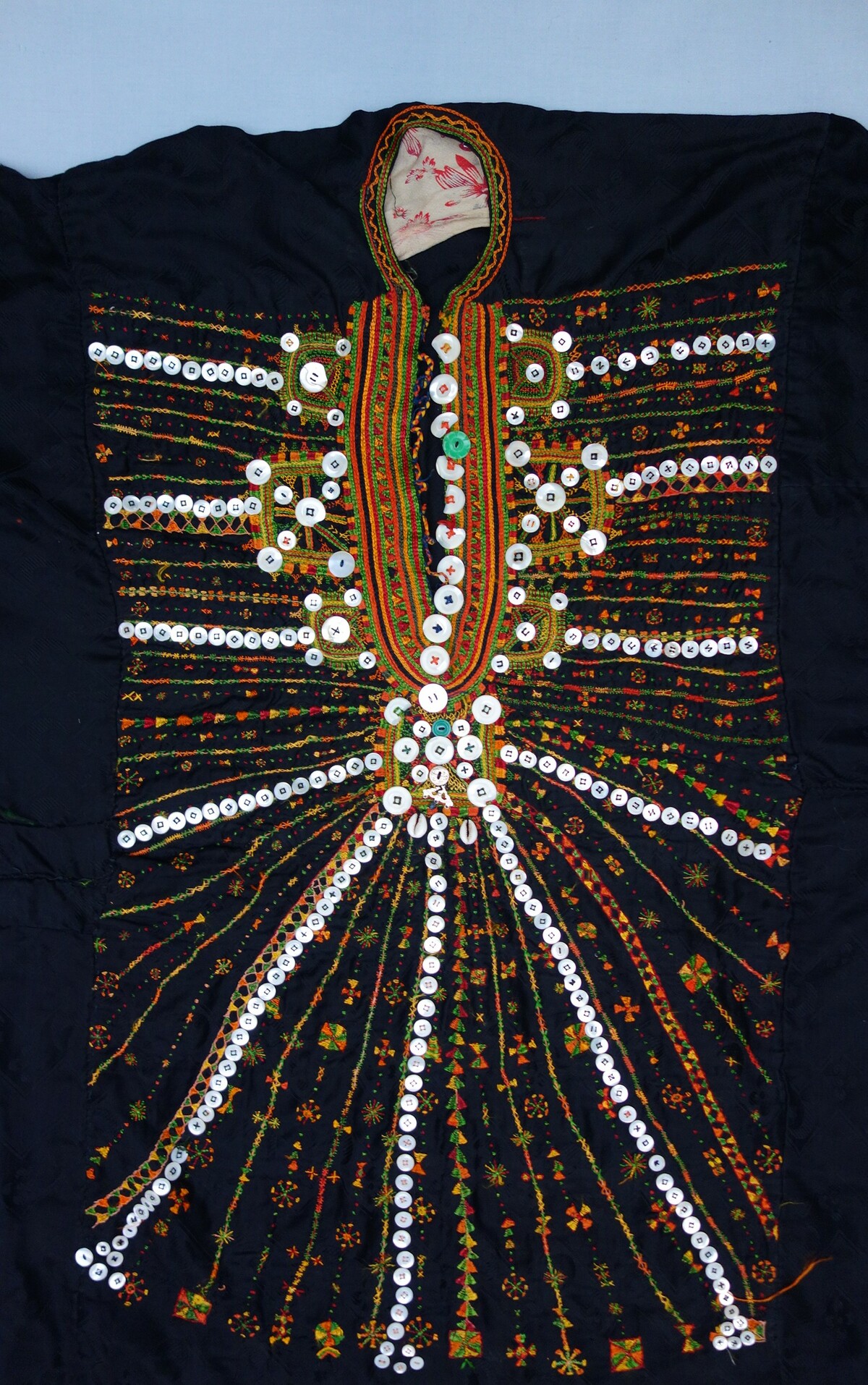 Detail from the yoke of a black Siwa dress (ashera hawak azdhaf; TRC 2008.0490).