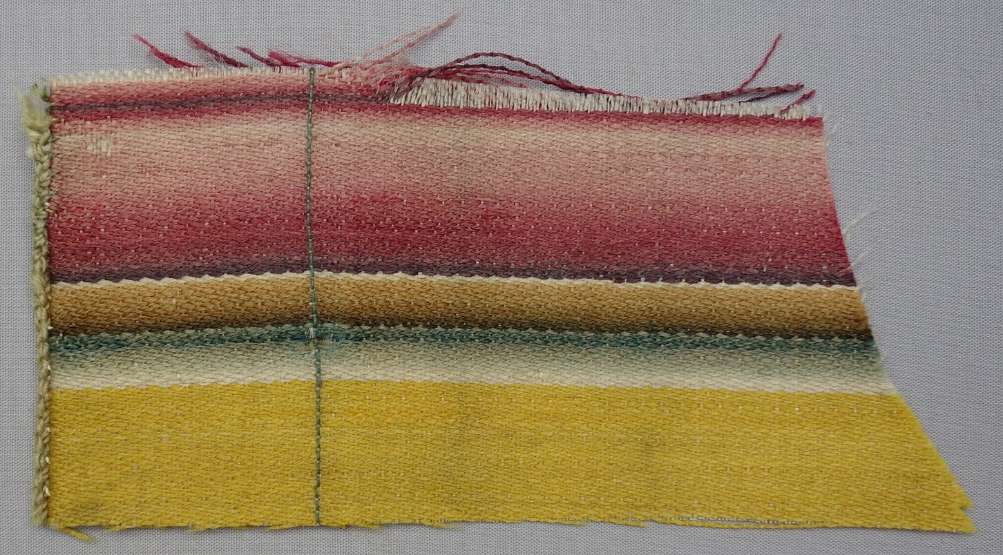 Length of 18th century worsted cloth from Norwich, England (with a 20th century machine stitched hem). This type was used for Dutch regional clothing (TRC 2015.0413).