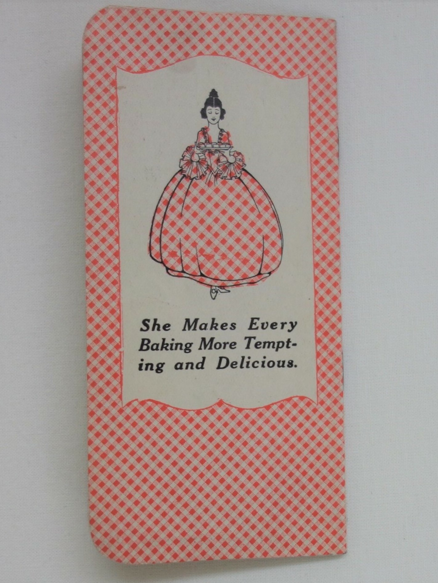 Notebook published by the Gingham Girl Flour Company, with the gingham-design also printed on their feed sacks (TRC 2018.0002).