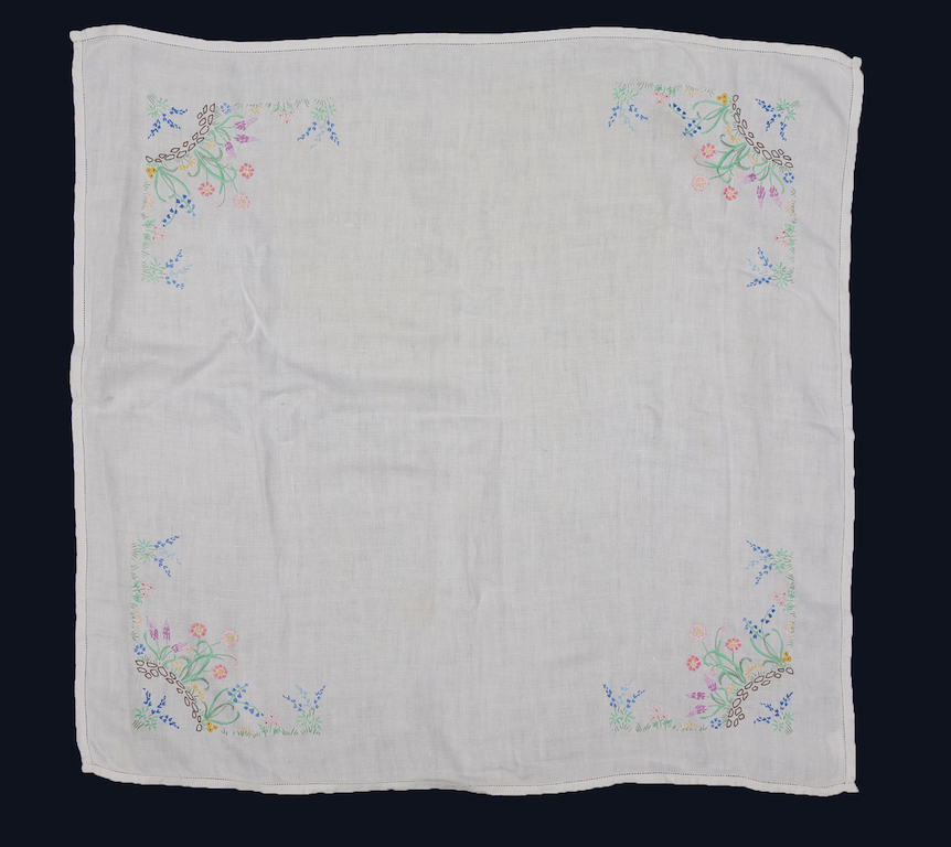 Afternoon table cloth embroidered at Scapa Flow, Orkney Islands, Scotland, early 1940s (TRC 2021.1332).
