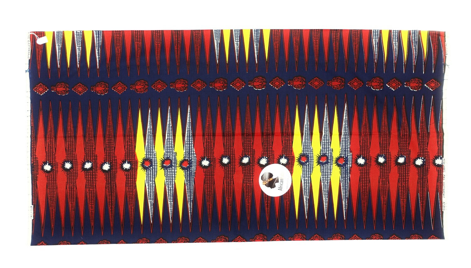 Length of cloth with an overall design of elongated diamonds in dark red, yellow, blue and white with star bursts in the same colours. These alternate with rows of stylised floral motifs in dark red, all of which are worked on a dark blue ground. There are selvedge texts that state: "VERITABLE WAX HOLLANDAIS VLISCO"  and "14/1178". The Netherlands, 2022 (TRC 2022.2258).