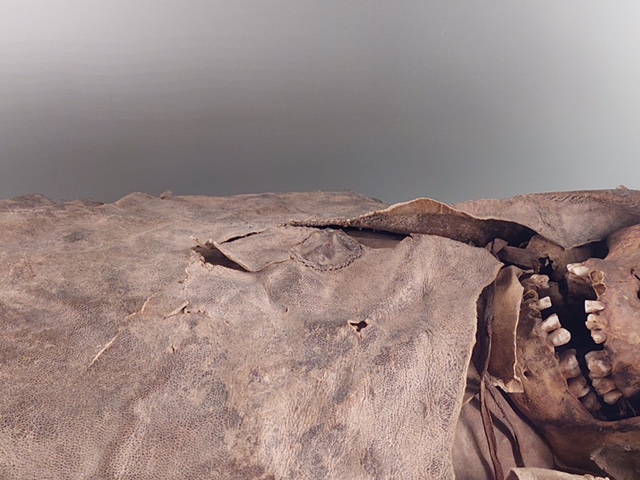 Stitching on Guanche mummy wrapping. Photo by Shelley Anderson.