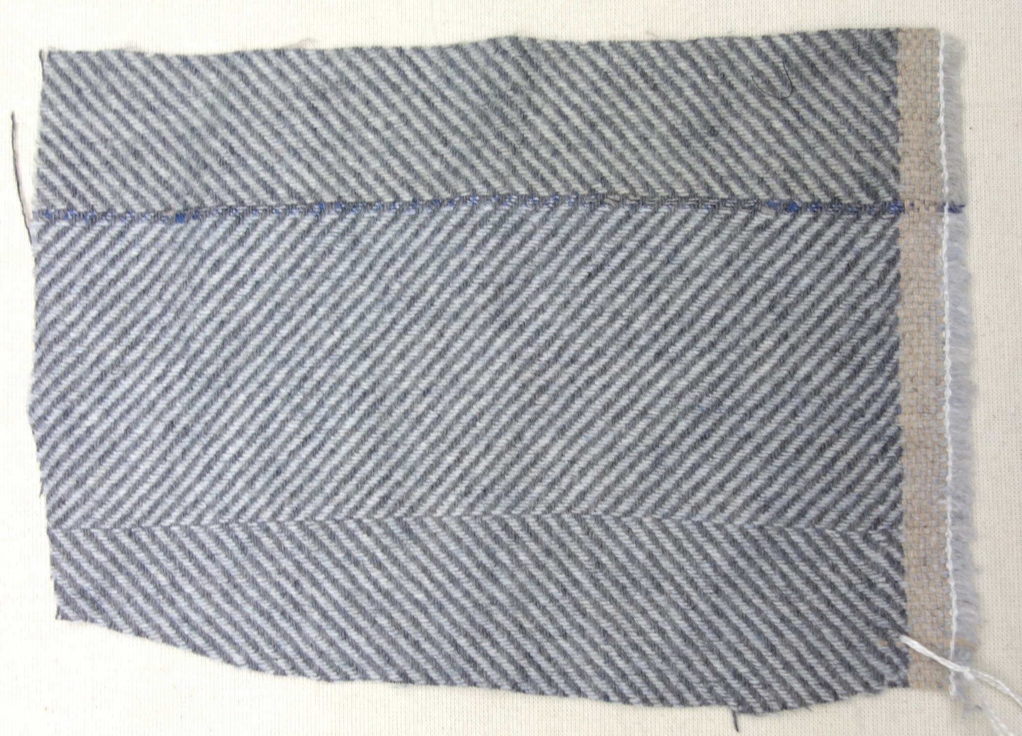 Fig. 7. Sample of a twill weave with a rapier selvedge strengthened with basket weave (TRC 2024.0456).