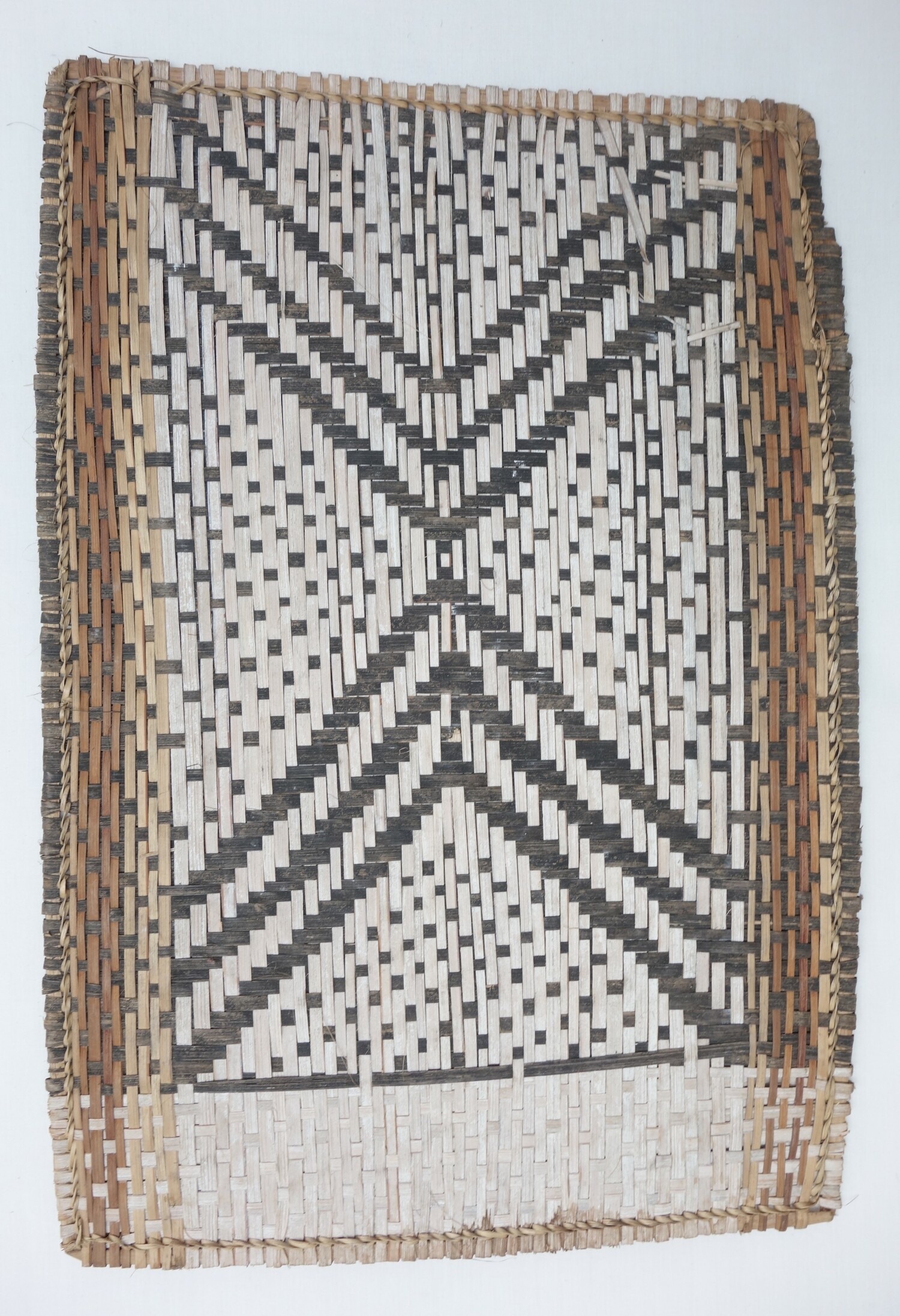 Fig. 2. Woven mat (losa), made from reed or bark, from the Mbola, Democratic Republic of the Congo, late 20th ntury (TRC 2025.1321).