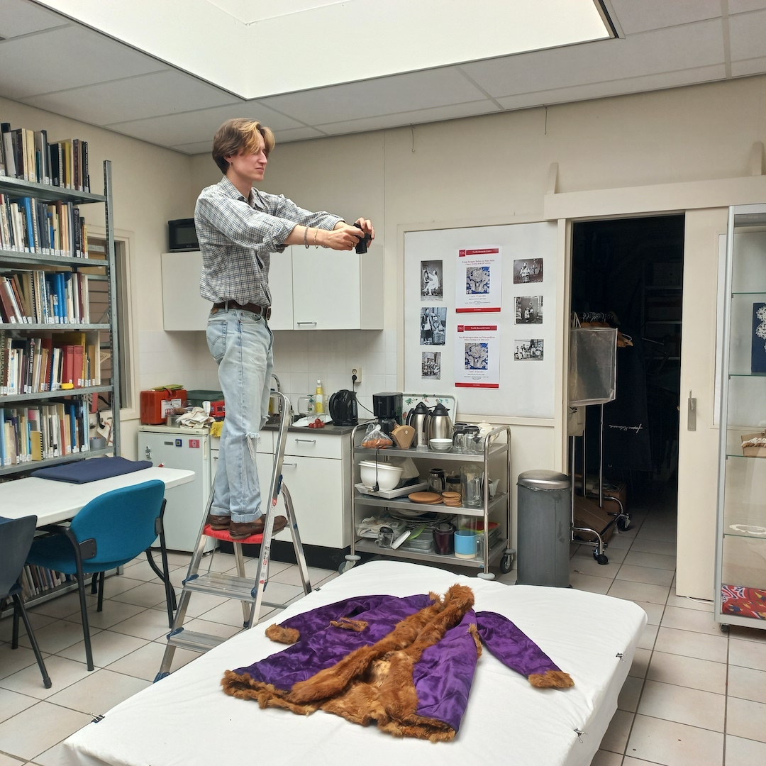 A TRC intern photographing one of the Turkish objects recently acquired. Photograph by the author.