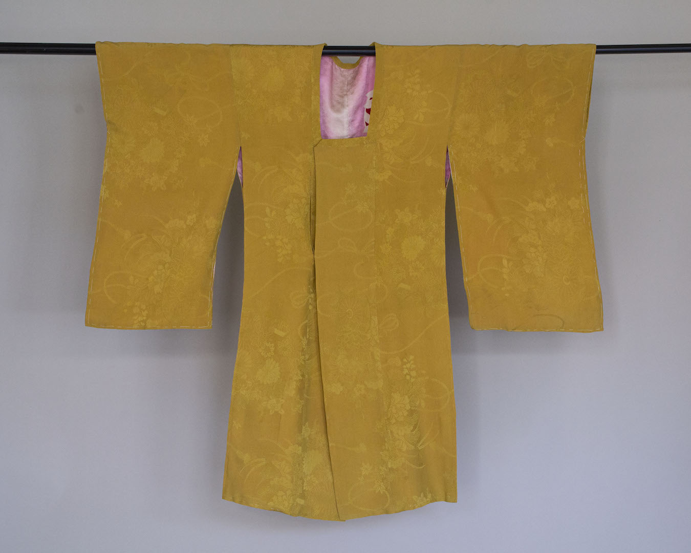 Woman's michiyuki (knee-length outdoor coat), with a damask floral pattern. Japan, 20th century.