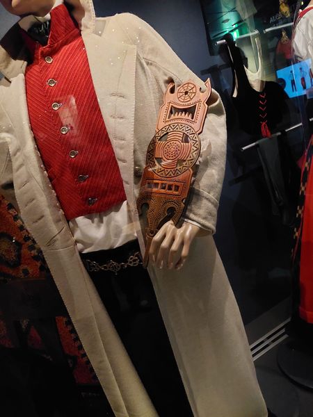 Mannequin in regional Finnish dress, holding a hand carved, decorated distaff, late 19th century. Such spindles were given to women as part of courtship for marriage. From the National Crafts Museum, Jyvaskyla. Photograph by Hanke van Prooije