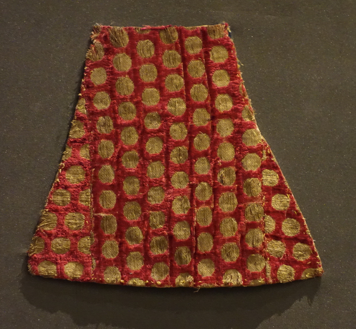 Piece of Iranian, silk velvet with gold thread dots. c. 14th century.