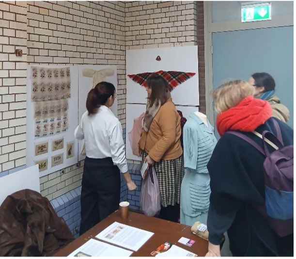 Fig. 4. Welcoming visitors to the TRC stand during Textile Inspiration Day.
