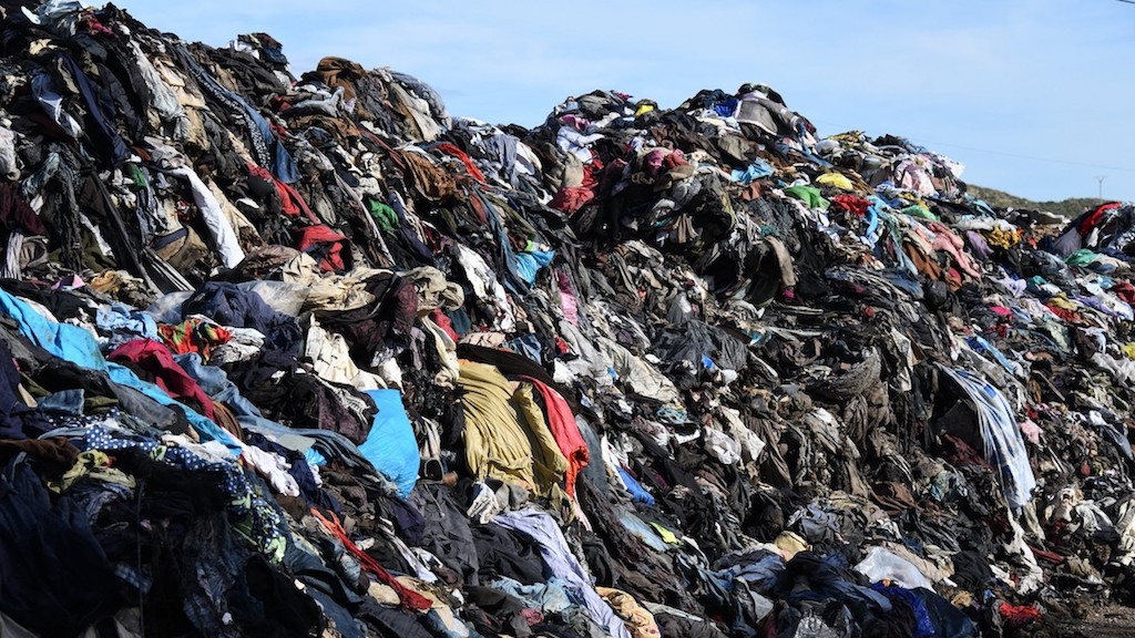 Massive landfills of discarded textiles.