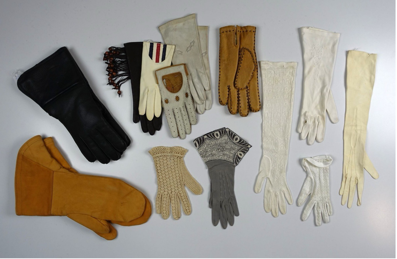 Fig 1: Assortment of gloves in the TRC collection showing the wide variety in materials, shape, and decoration used.