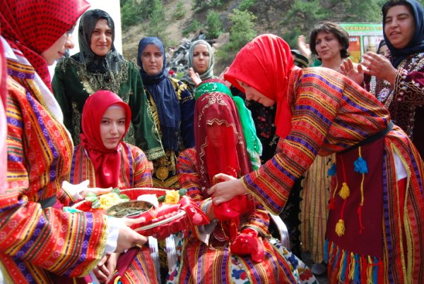 Vivienne Rivis (right) and Gillian Vogelsang (left) at the TRC, showing the 1872 sampler worked by Jane Hardy, Yorkshire.