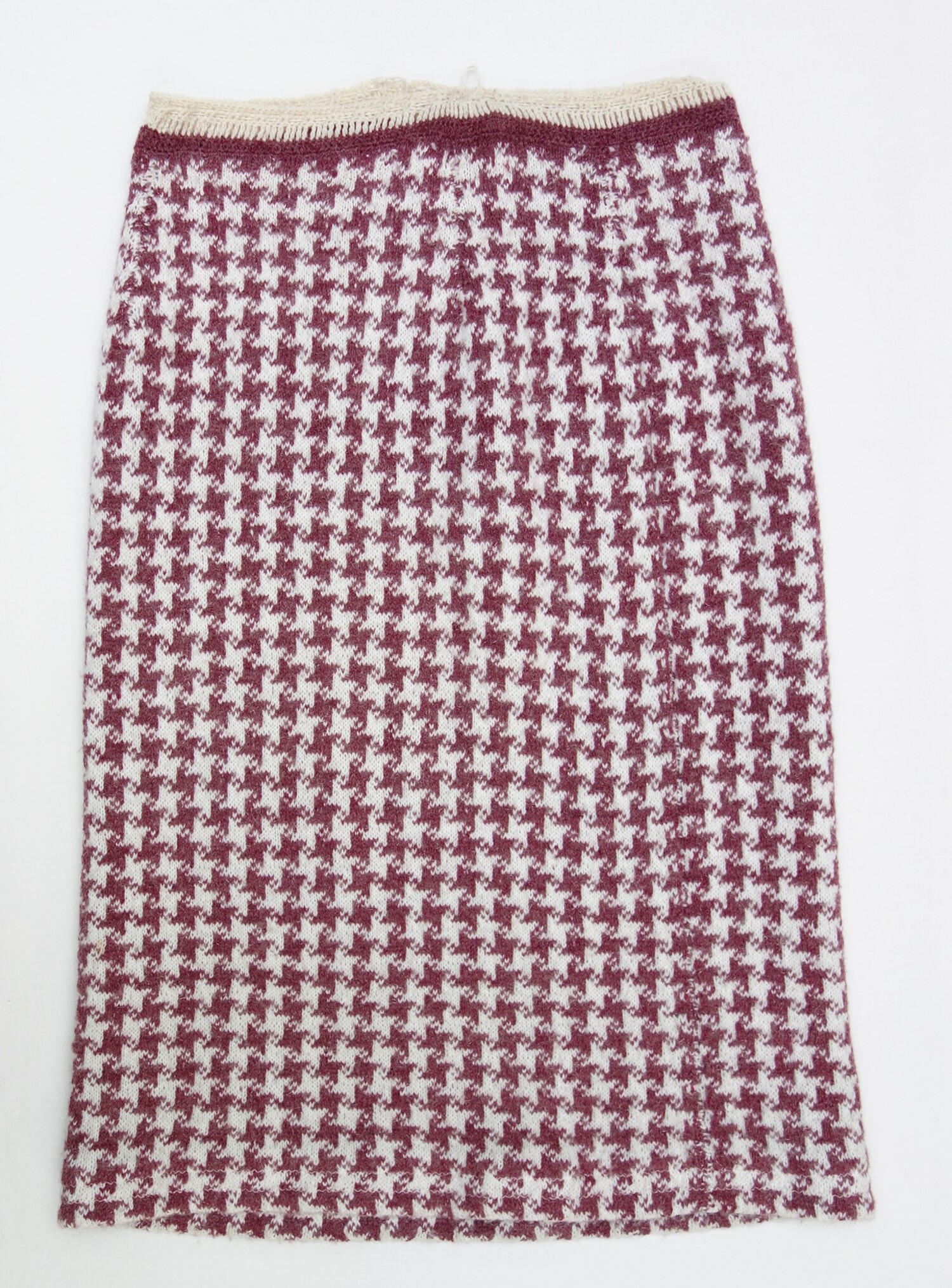 Hand knitted, woollen skirt, Romania, 1970's and 1980's. Donation Radu family (TRC 2020.0347b). The jacket and skirt were made in the style of the fashion house of Chanel, Paris.